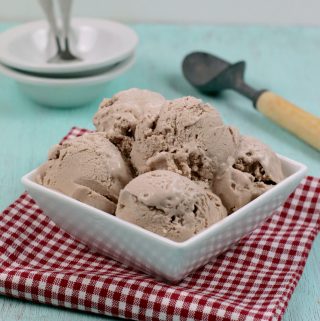 Homemade Weight Watchers Ice Cream in a white bowl on a red and white napkin