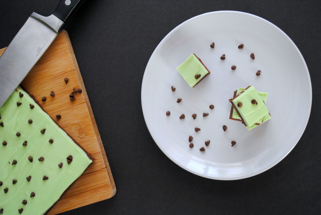 Mint Chocolate Frosting Fudge on a white plate