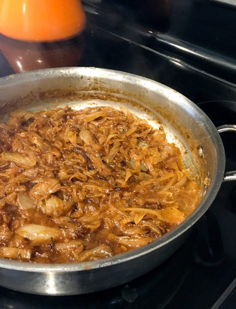 Savory Caramelized Onions in a skillet on the stove