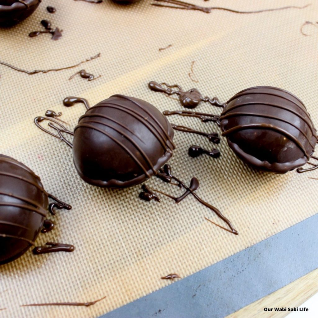 Drizzled chocolate over hot chocolate bombs