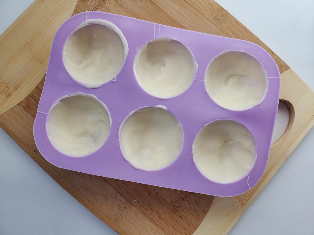 filled molds with white chocolate