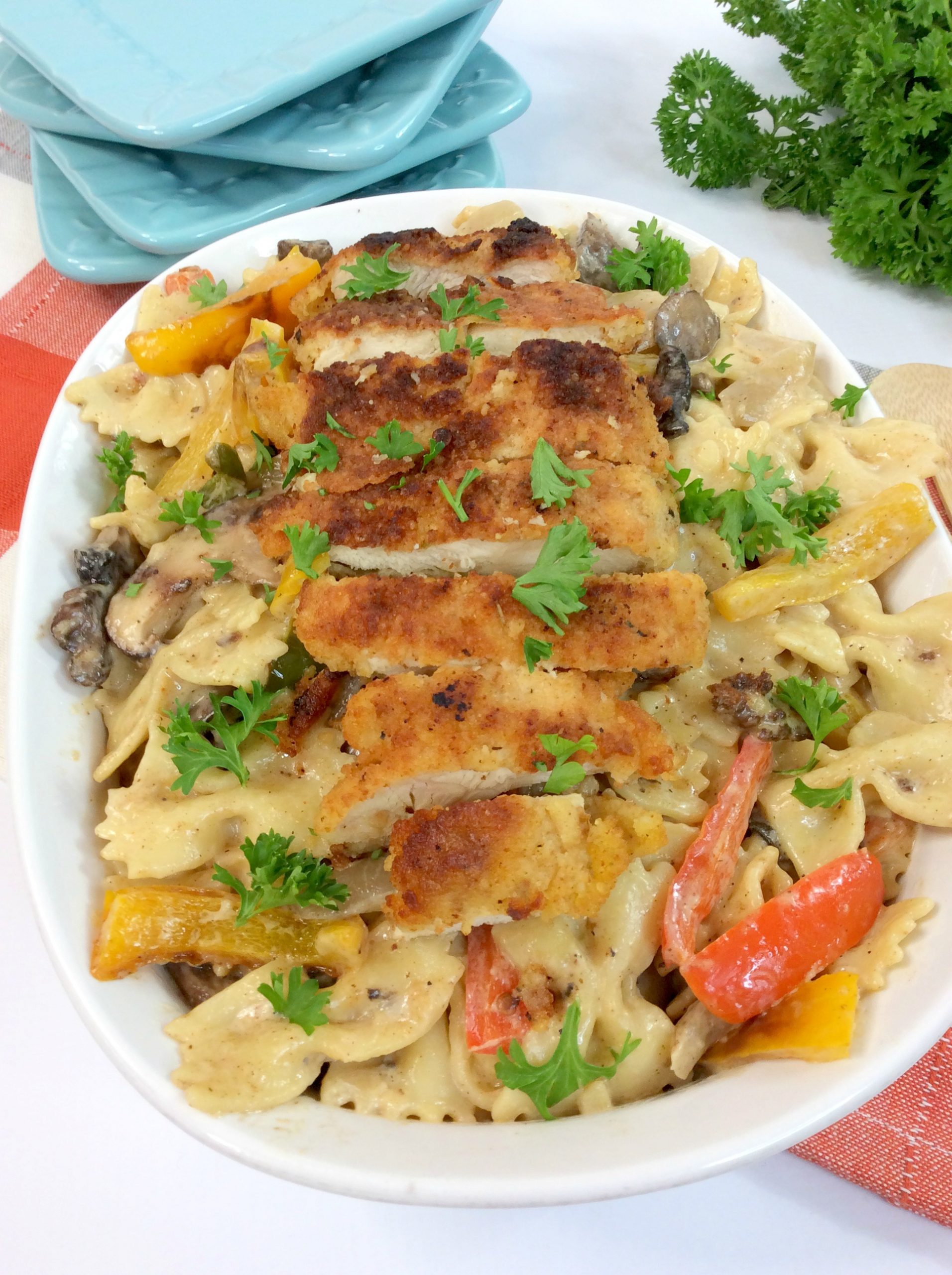 The Cheesecake Factory Louisiana Chicken Pasta garnished with parsley.