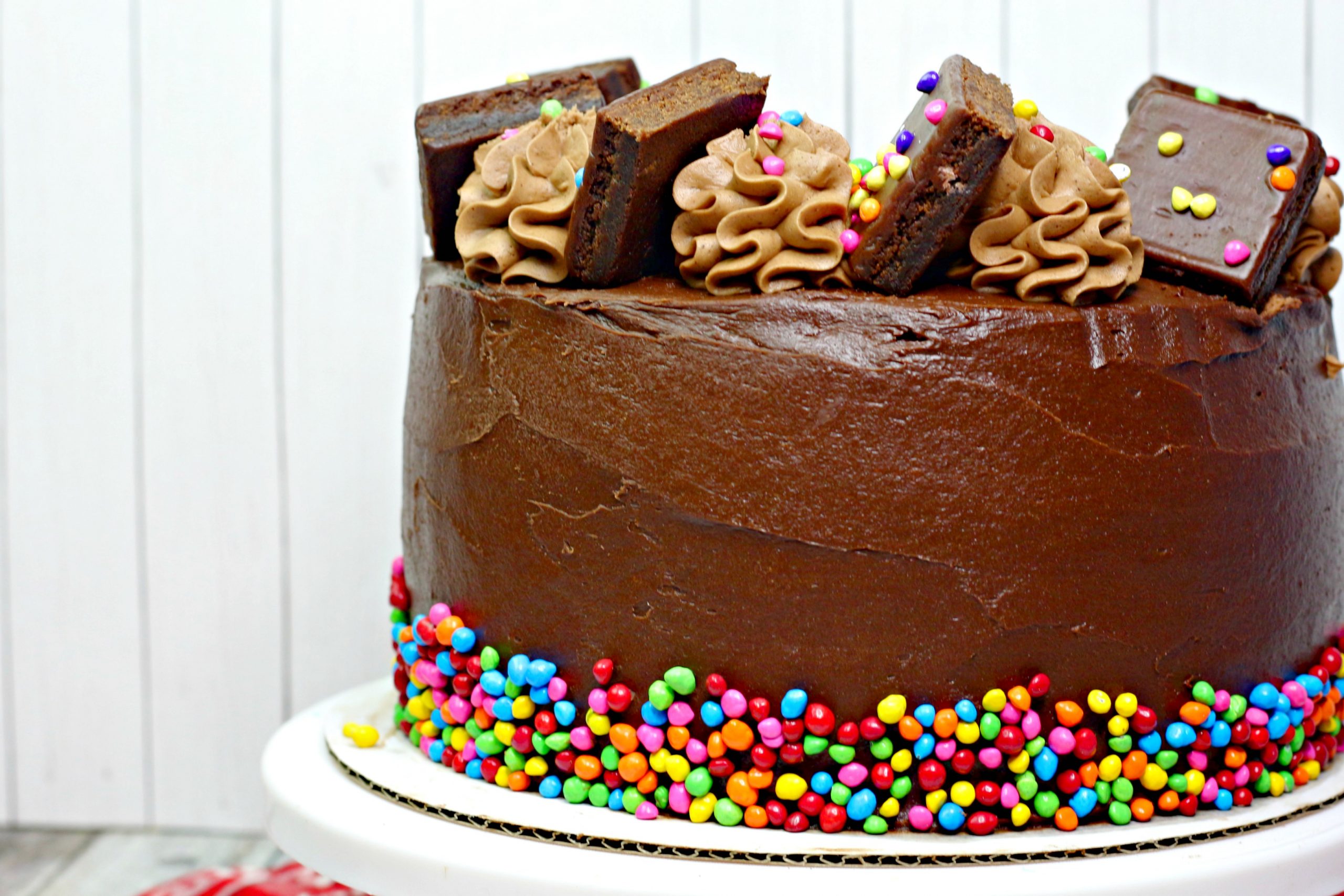 Cosmic Brownie Cake topped with cosmic brownies and more chocolate frosting.