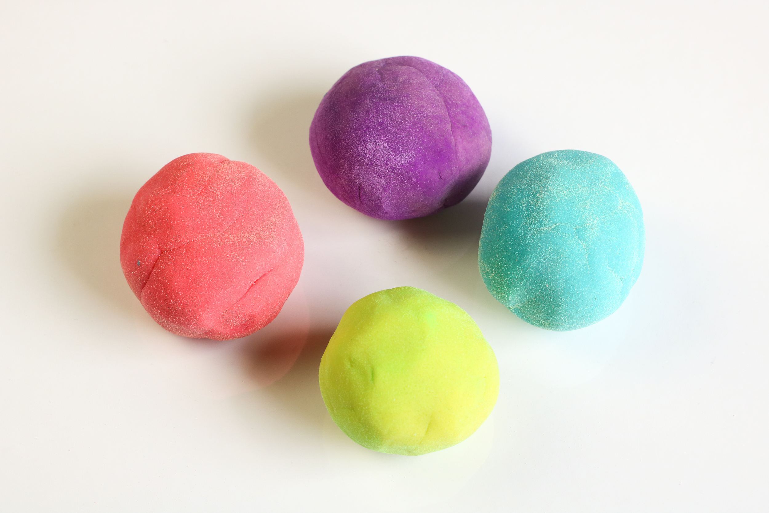 Four of the play dough balls.