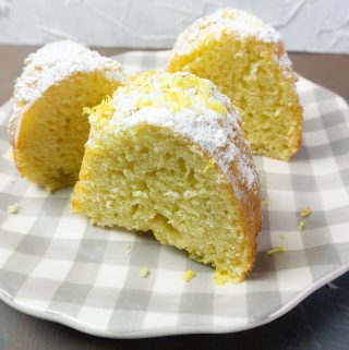 Meyer Lemon Bundt Cake on a checkered serving dish.