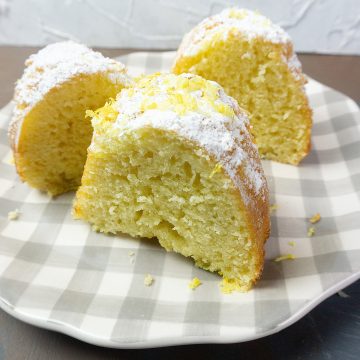 Meyer Lemon Bundt Cake on a checkered serving dish.