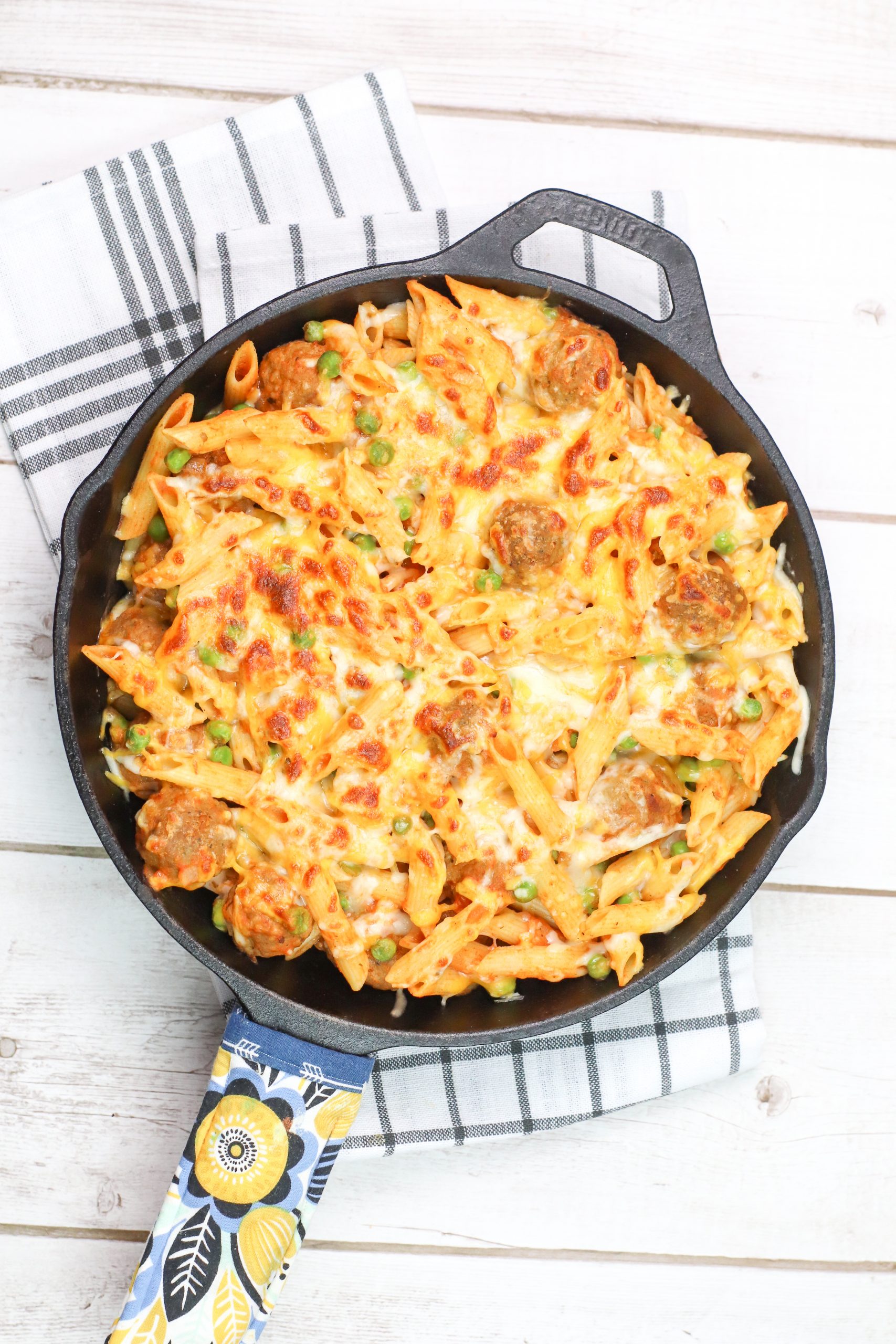 skillet with pasta and meatballs