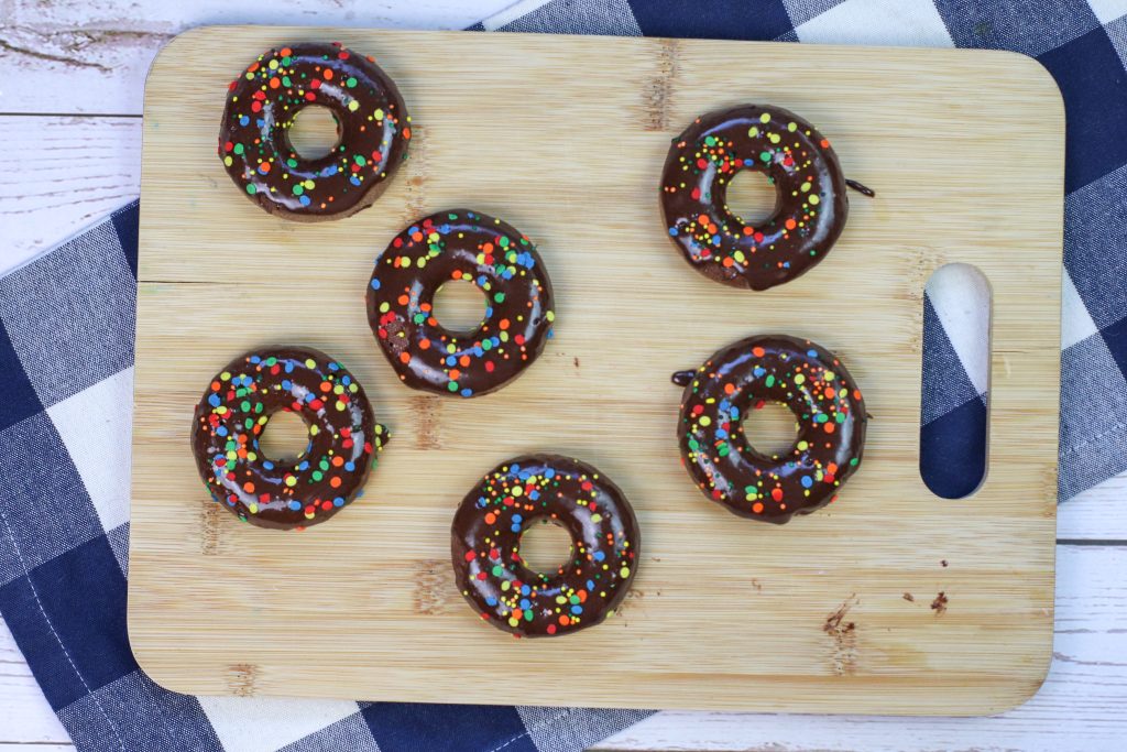 ww chocolate donuts on a cutting board