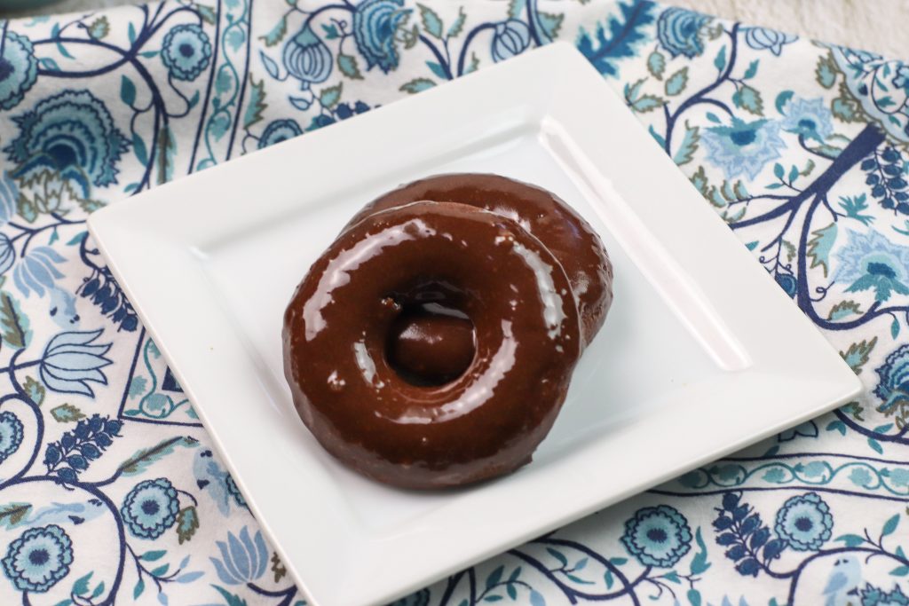 ww chocolate donuts on a white plate