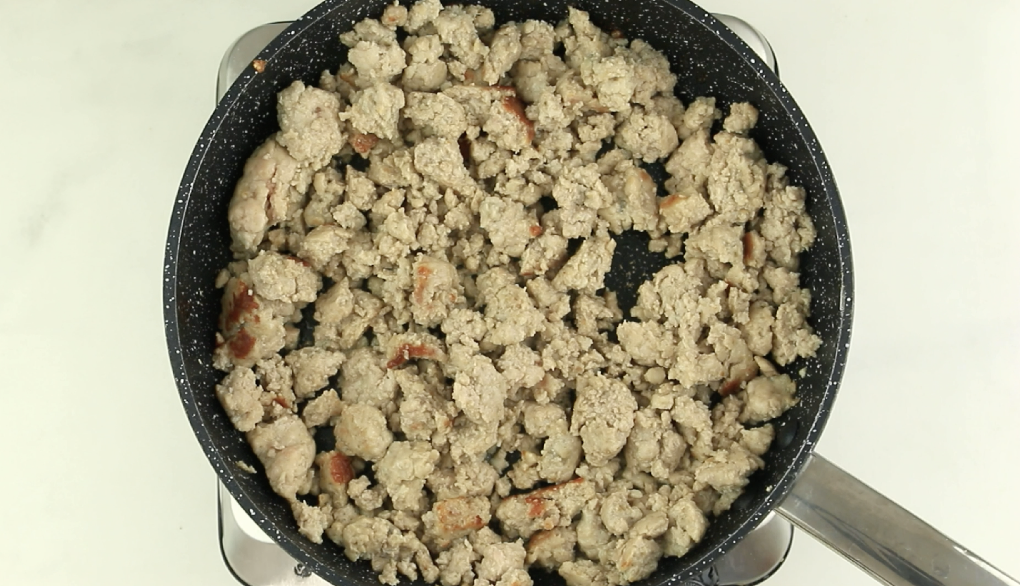 chicken sausage cooked in a pan
