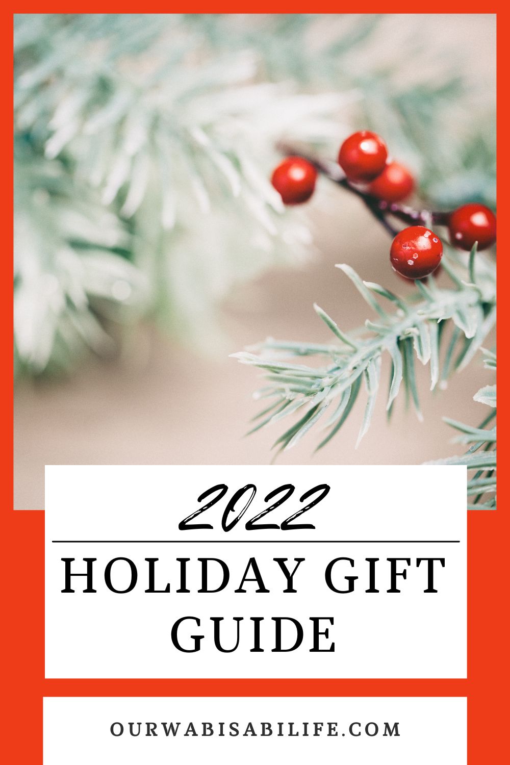 2022 Holiday gift guide with evergreen and holly berries