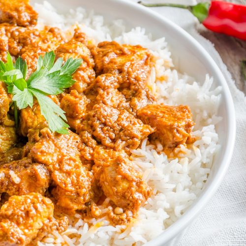 butter chicken with basmati rice and naan