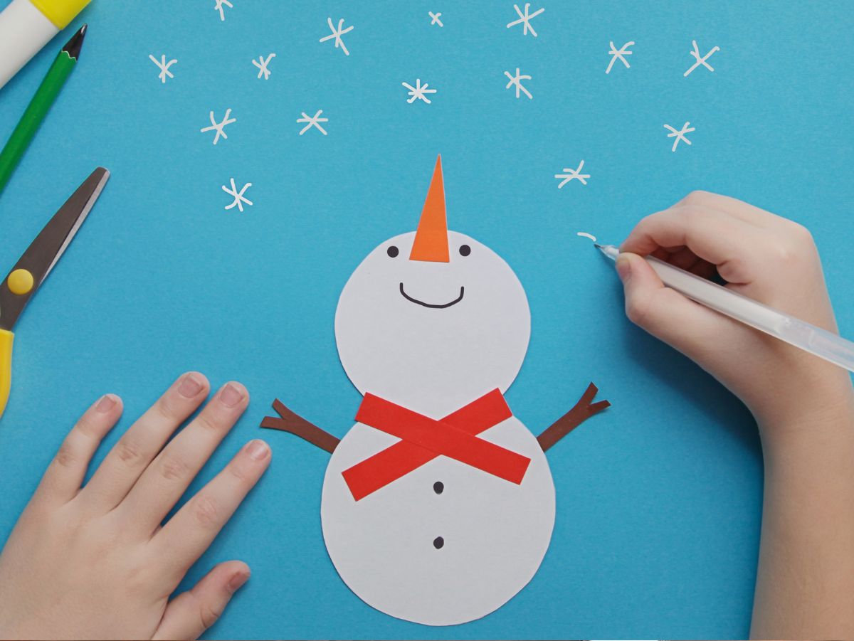 snowman on blue paper