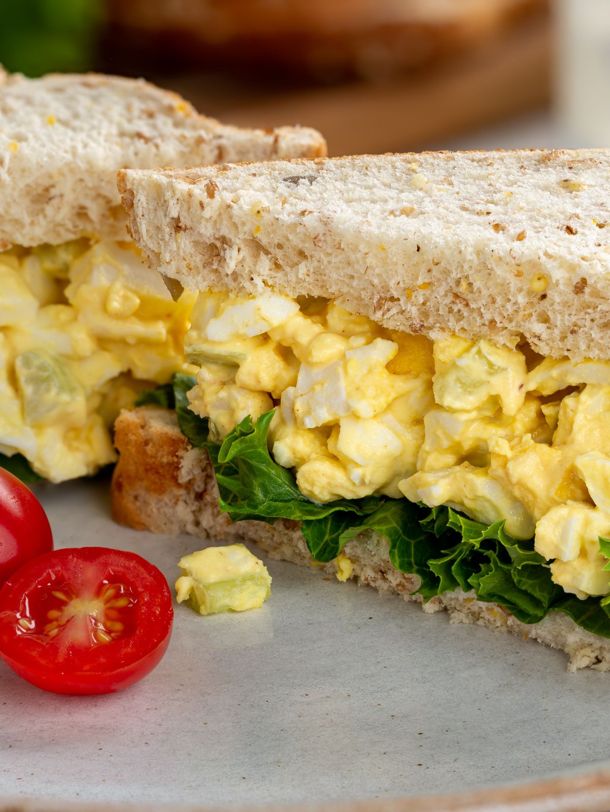 egg salad on bread with lettuce