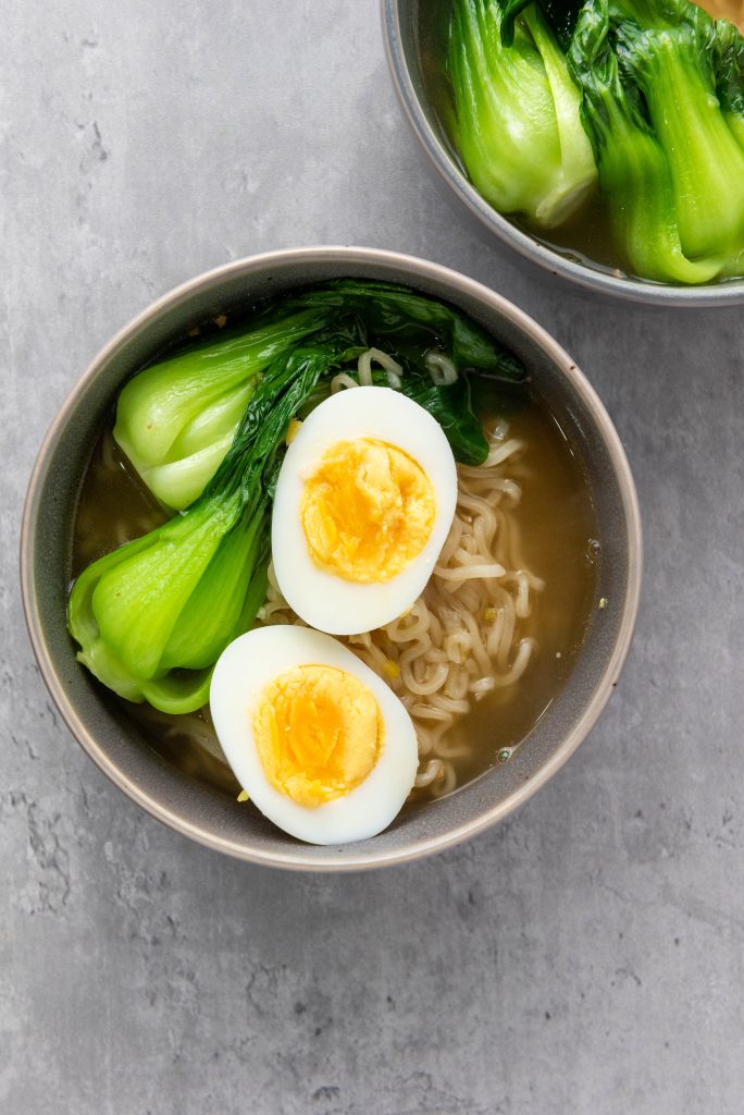 bok choy and eggs in the bowl