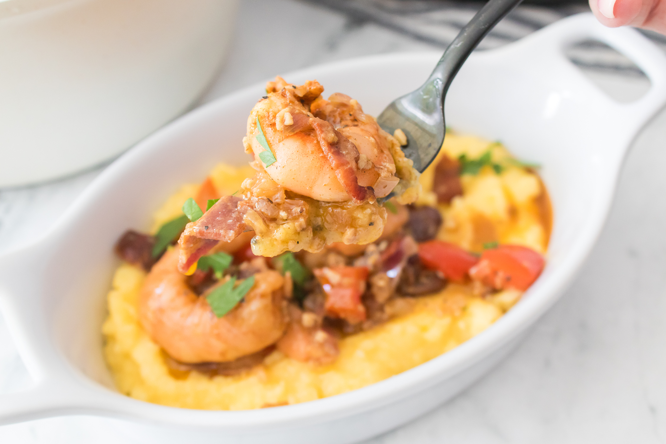 grits and shrimp in a white bowl