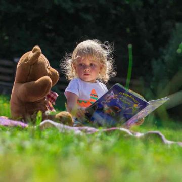 kid and teddy bear