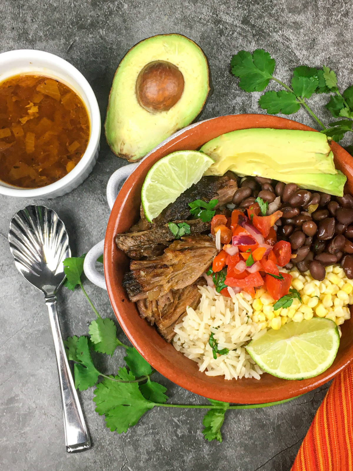 chipotle copycat carnitas with avocado and onions