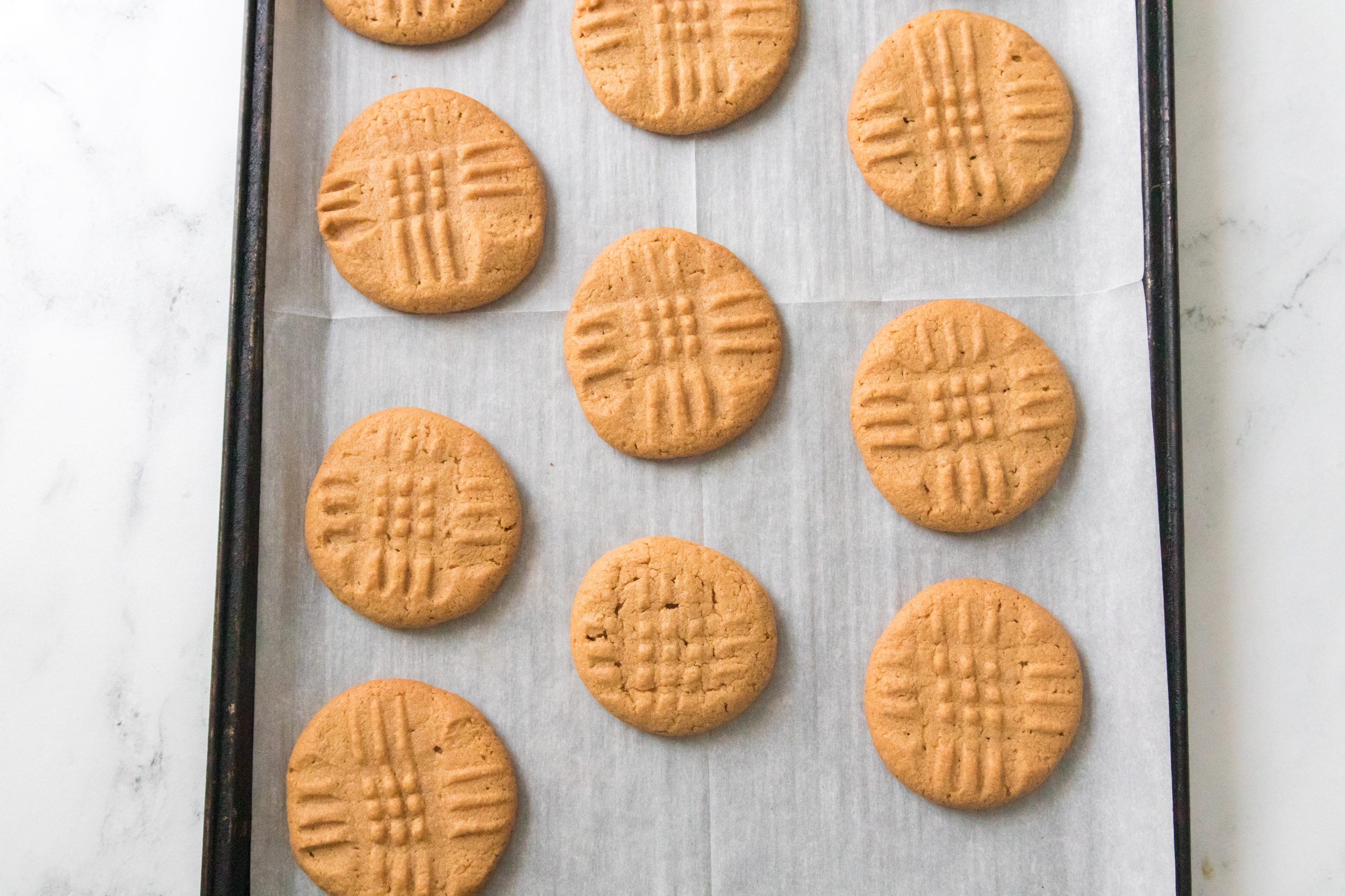 baked cookies on a cookie sheet