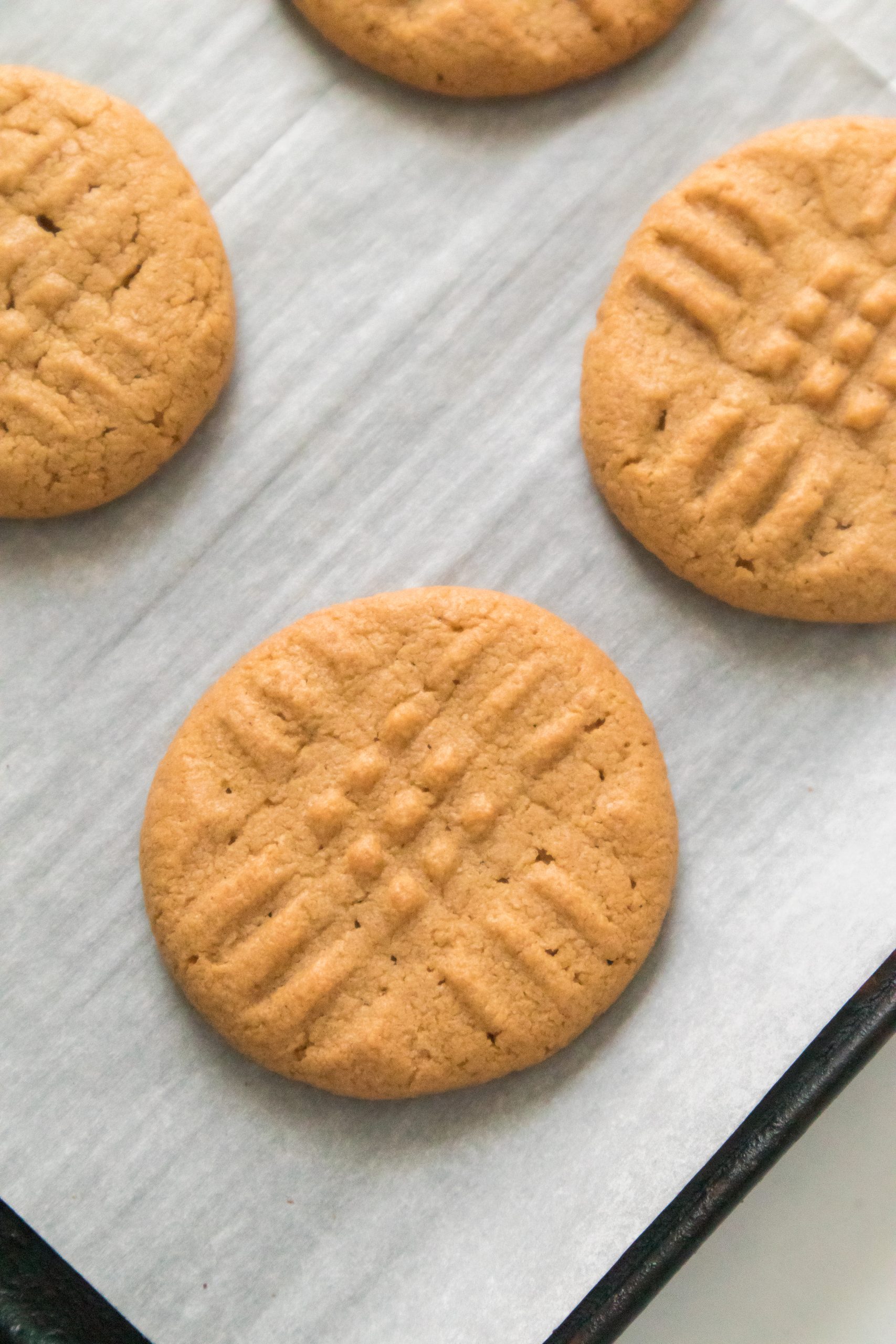 3 ingredient peanut butter cookies on a cookie sheet