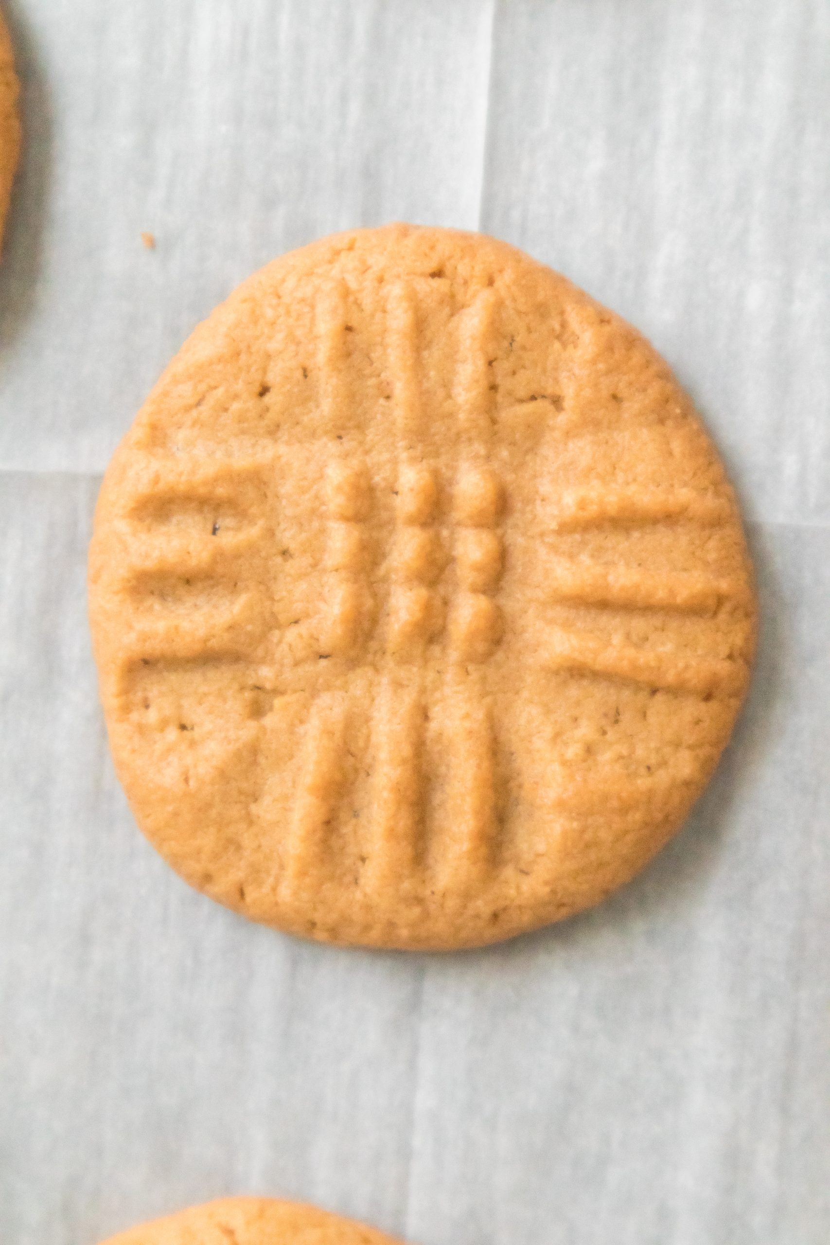 3 ingredient peanut butter cookies on a cookie sheet