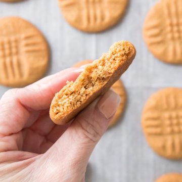 cookie in hand over a sheet truck