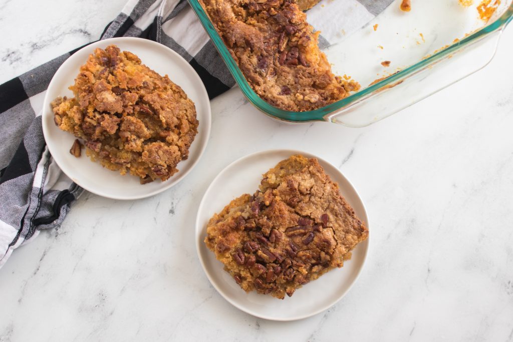 pumpkin dump cake on white plates