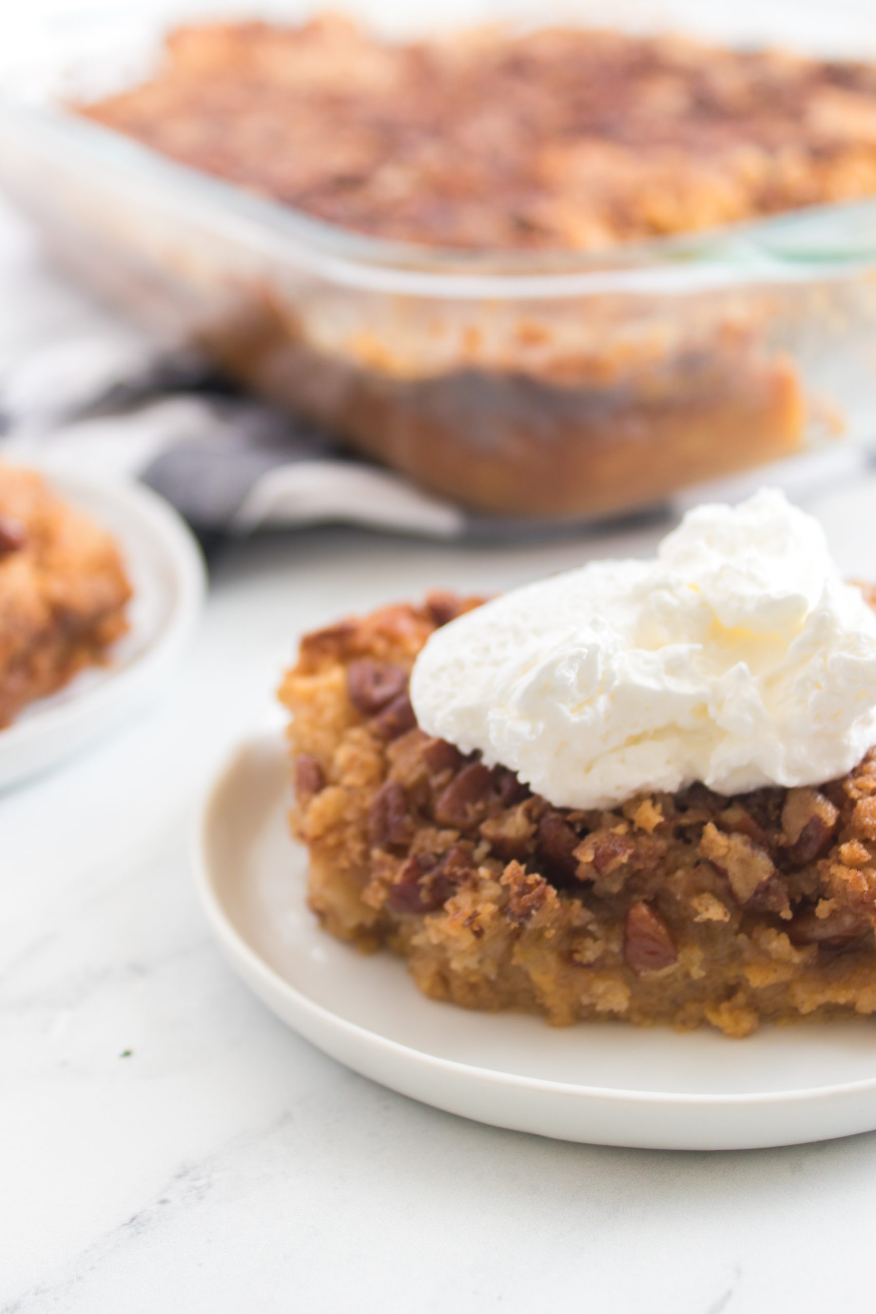 pumpkin dump cake on a white plate