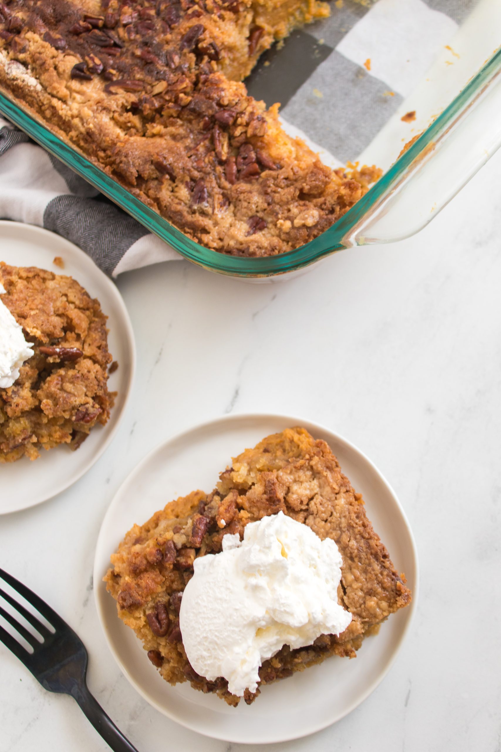 pumpkin dump cake on a white plate