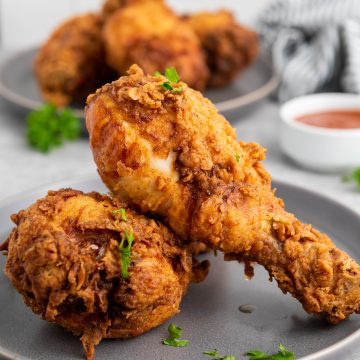 buttermilk fried chicken on a grey plate