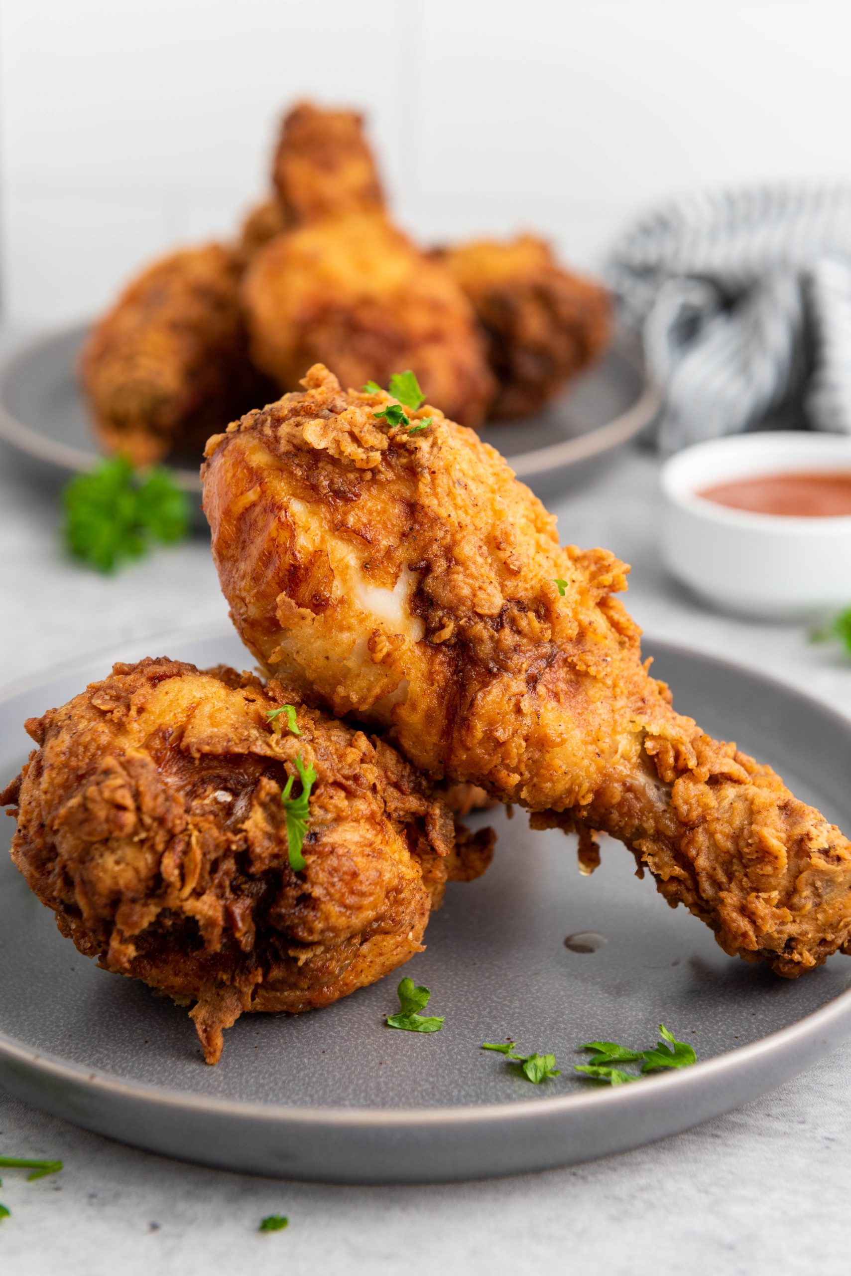 buttermilk fried chicken on a grey plate