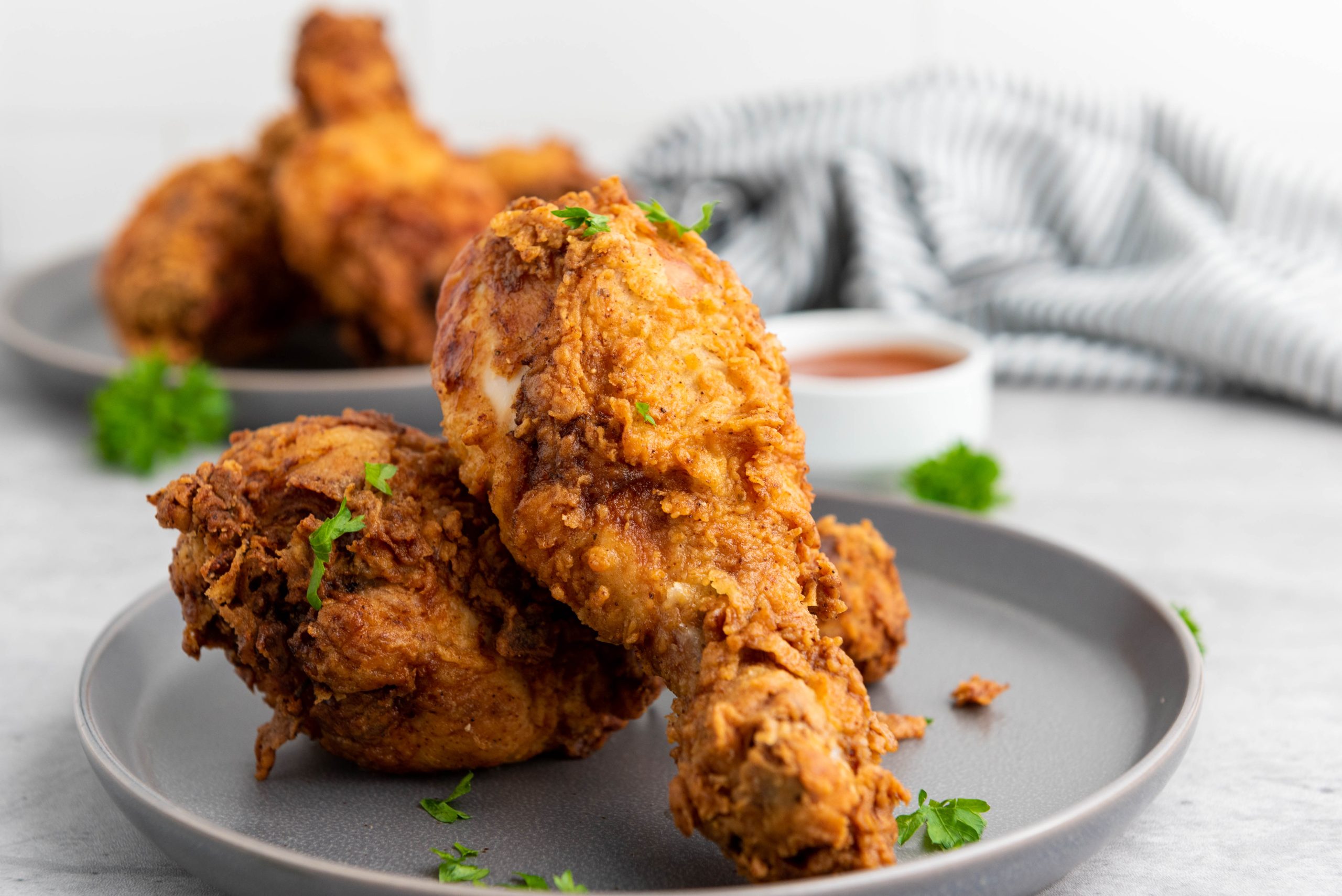 buttermilk fried chicken on a grey plate