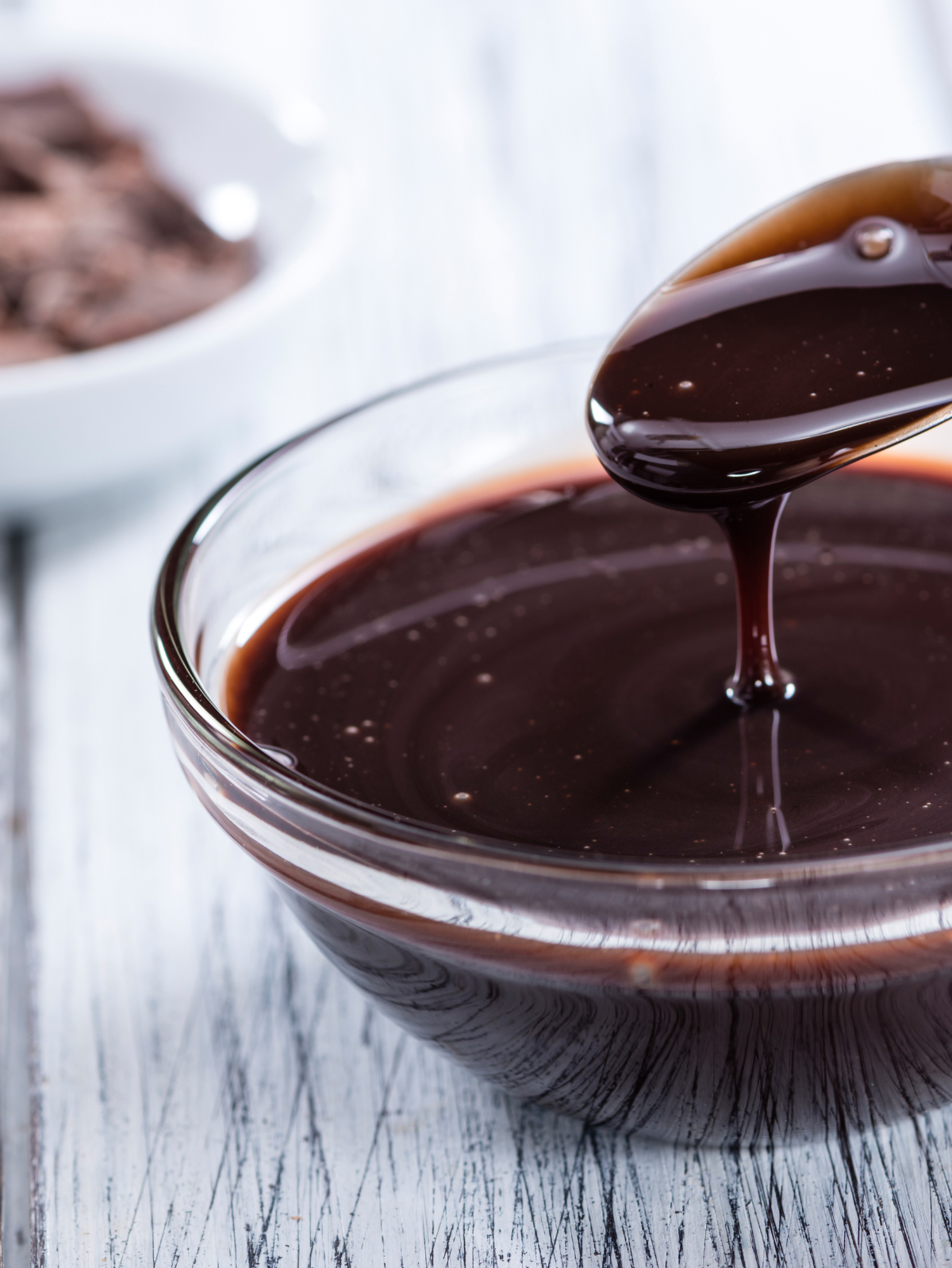 the best chocolate syrup in a clear bowl