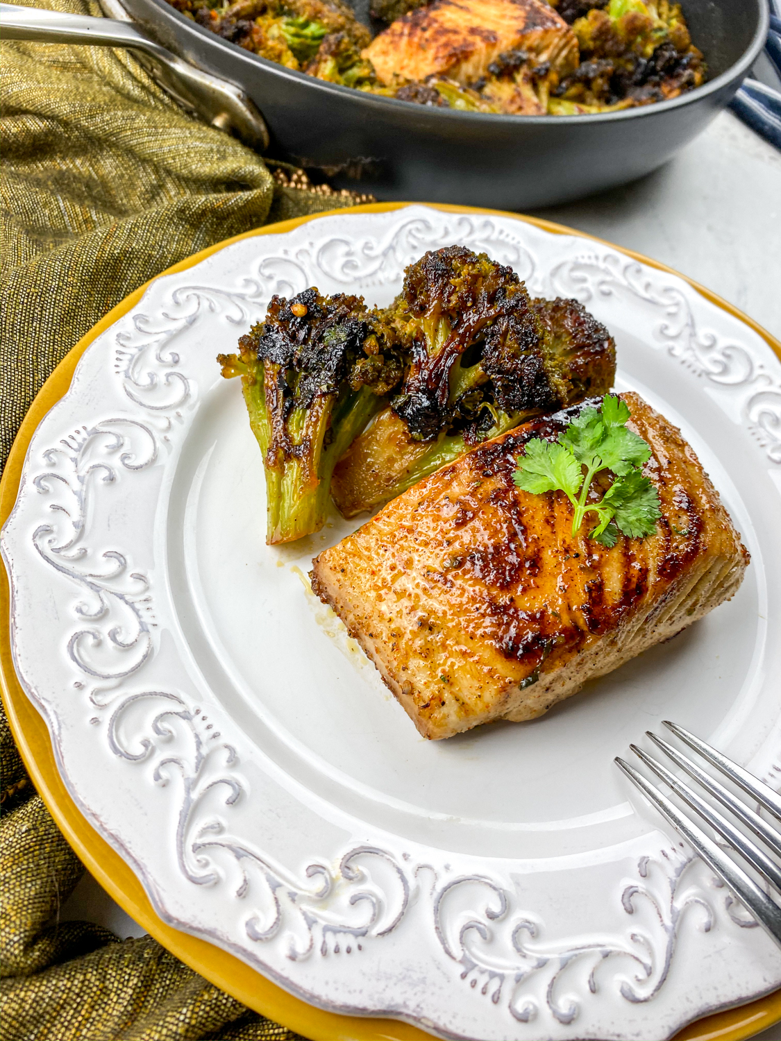 Chili Lime Mahi Mahi on a table with a green cloth.