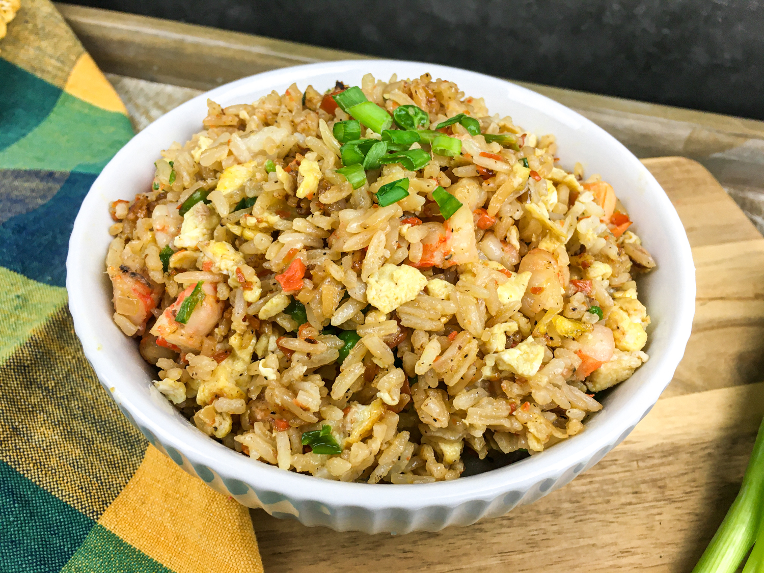 Easy Shrimp Fried Rice in a white bowl.
