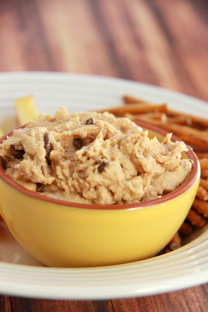 Cookie Dough Dip served with pretzels and apples.