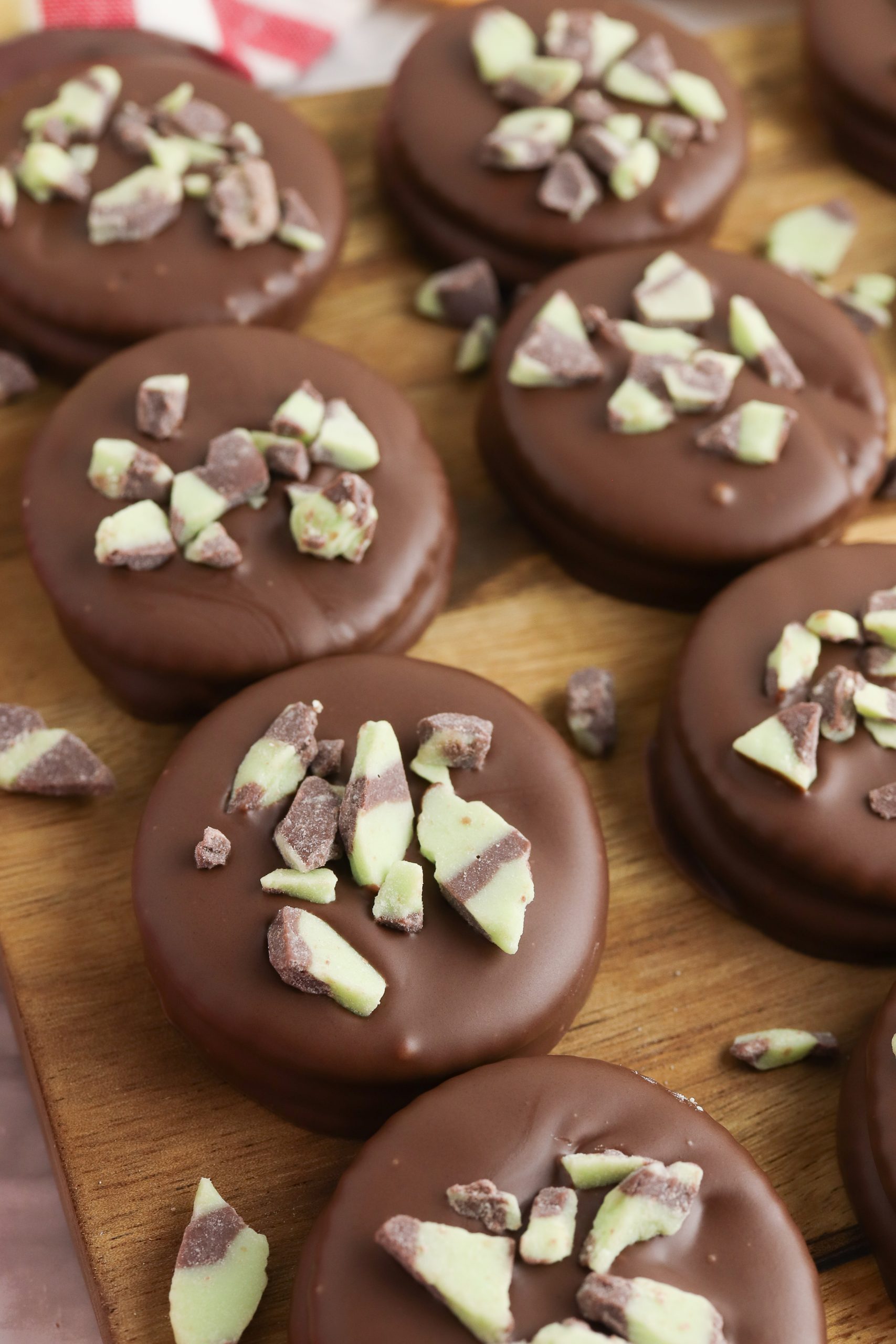 Ritz cracker thin mints on a wooden board