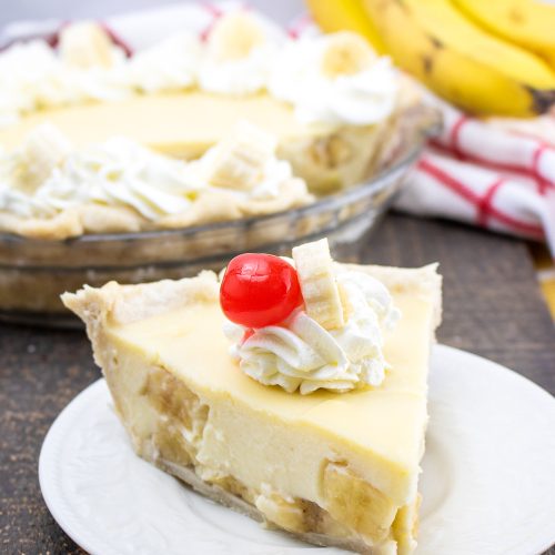 banana cream pie on a white plate