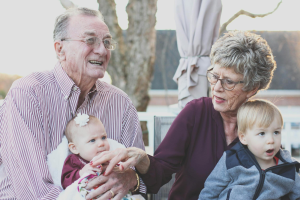 elderly couple with a child