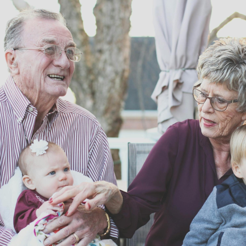 elderly couple with a child