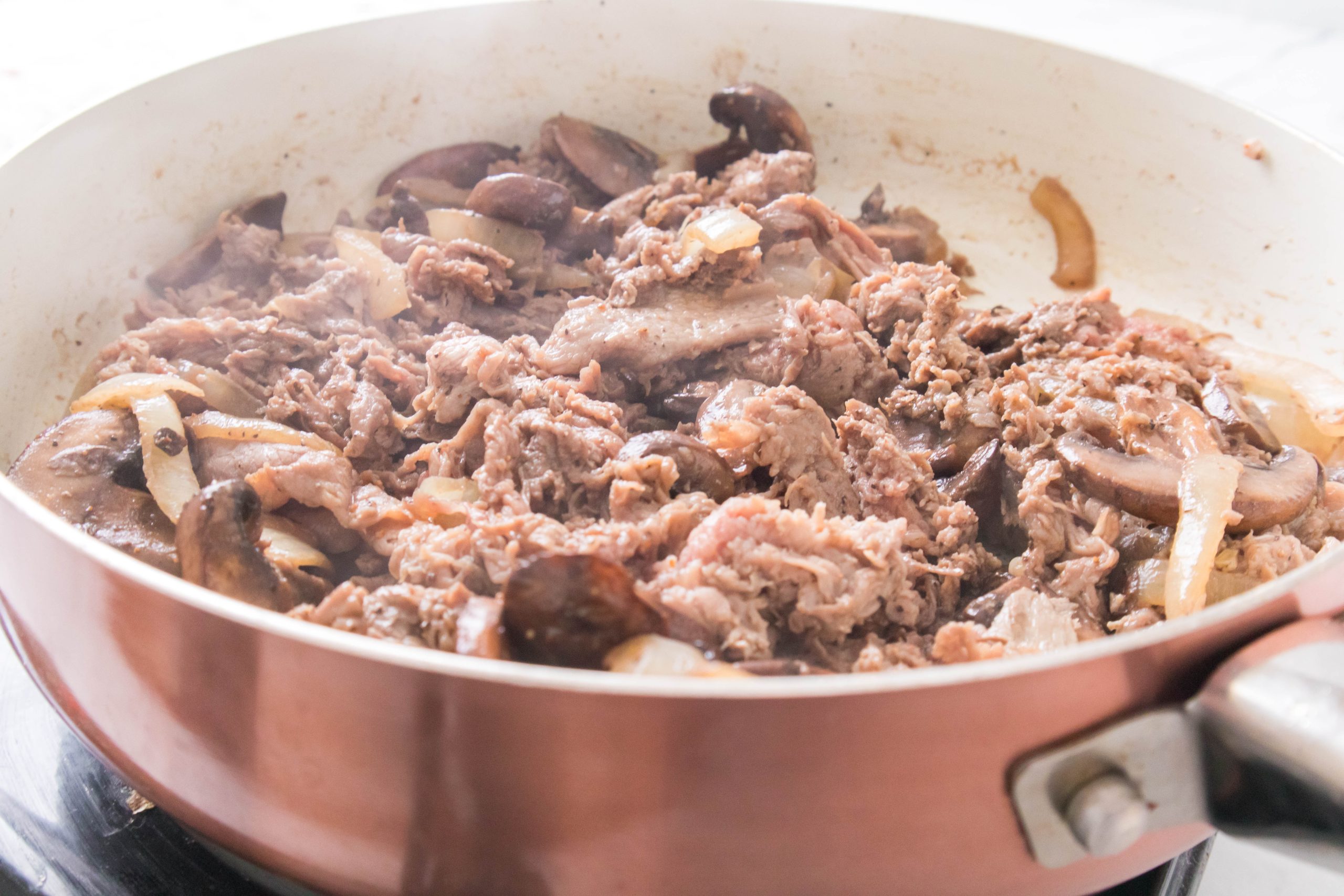 cooked steak in the pan