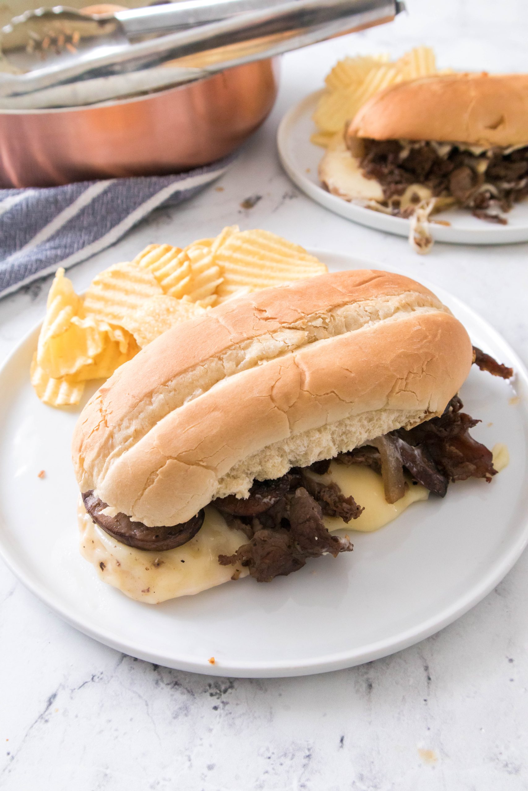 cheesesteak on a white plate