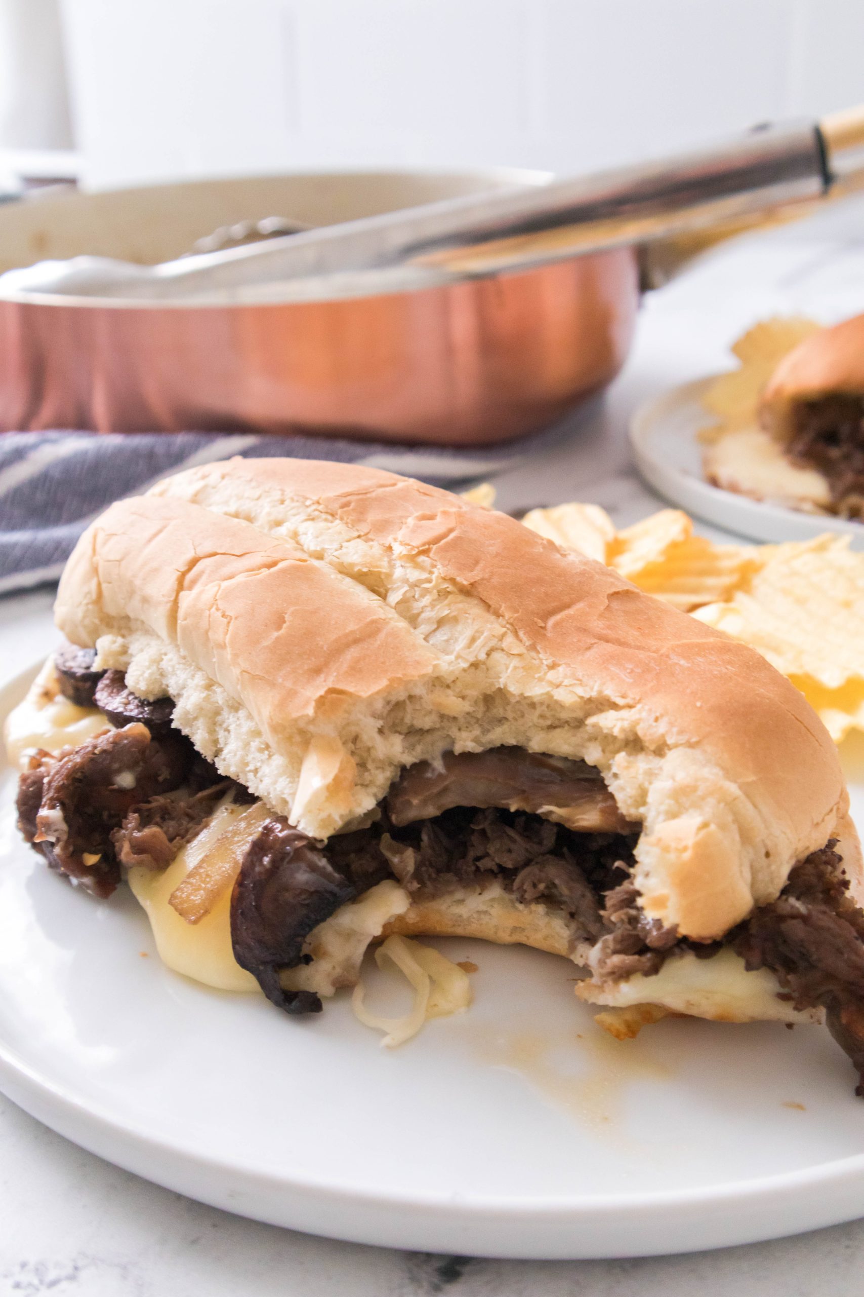 Philly Cheesesteak with a bite out