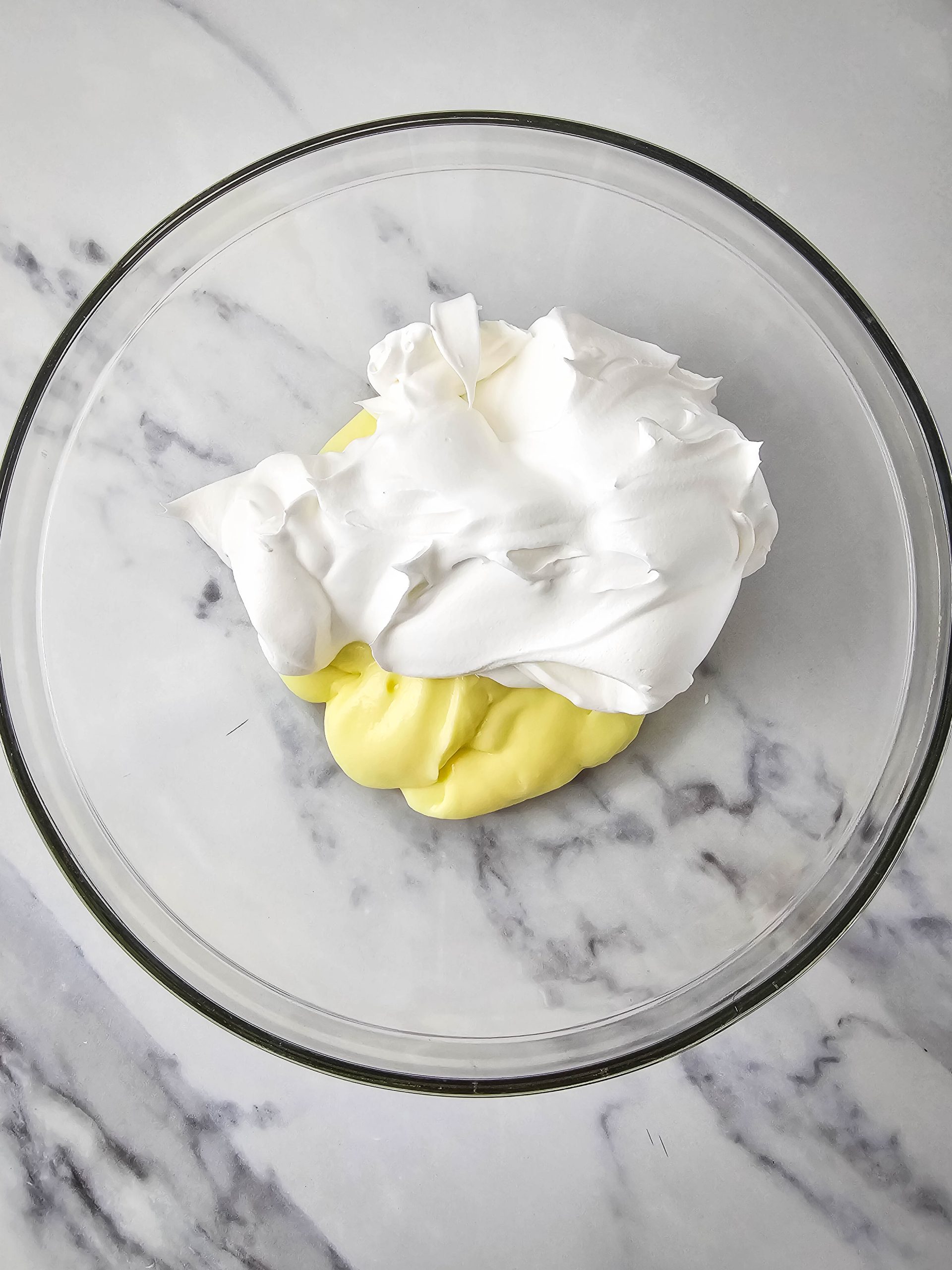 whipped topping and pudding in a bowl