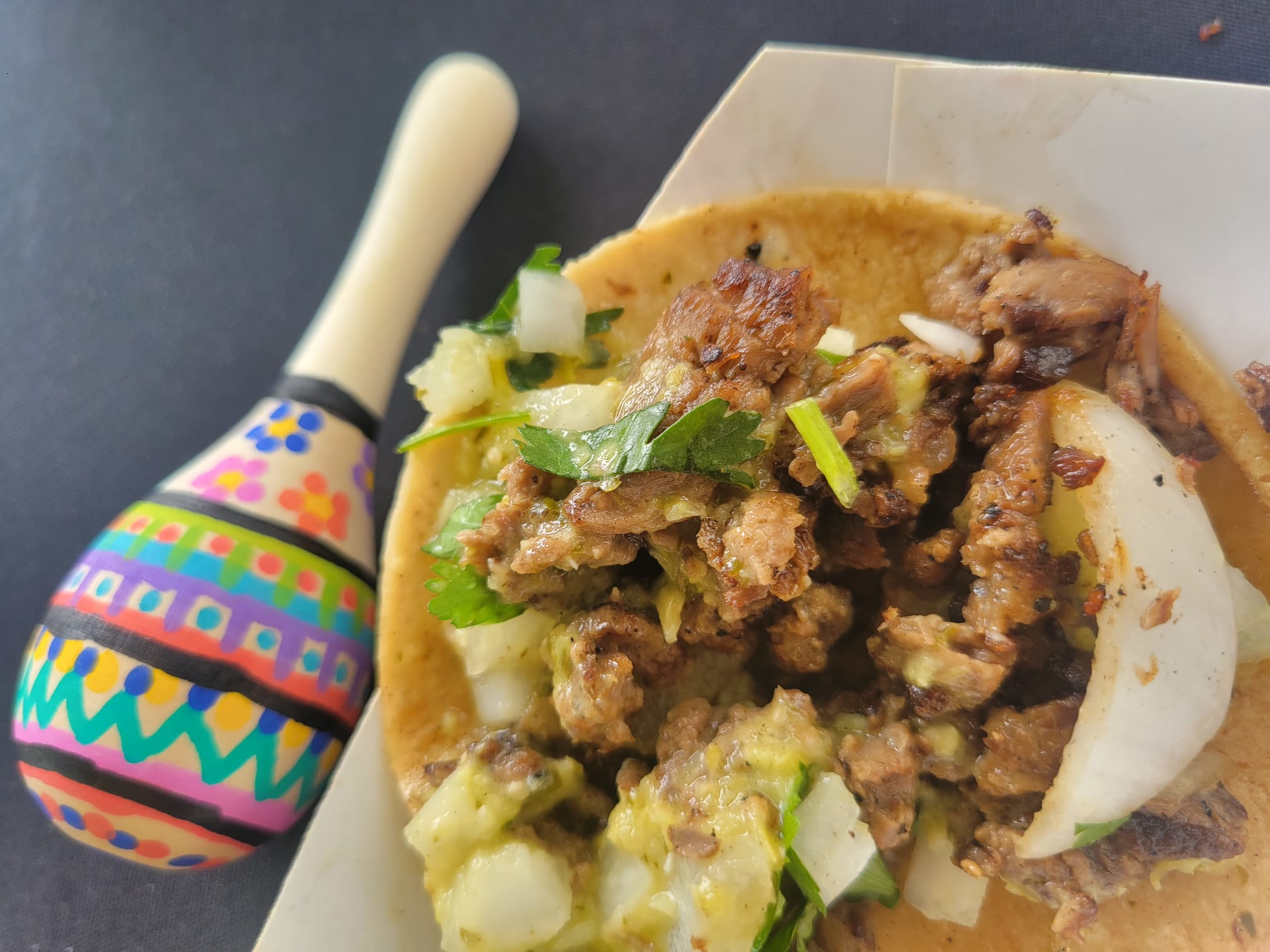 maraca next to a taco