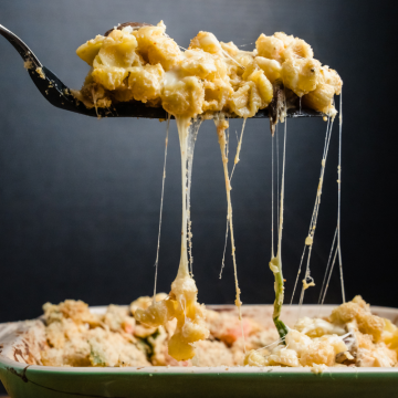 mac and cheese casserole on a spoon