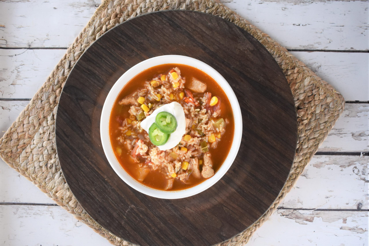 Southwest chicken rice soup in a white bowl