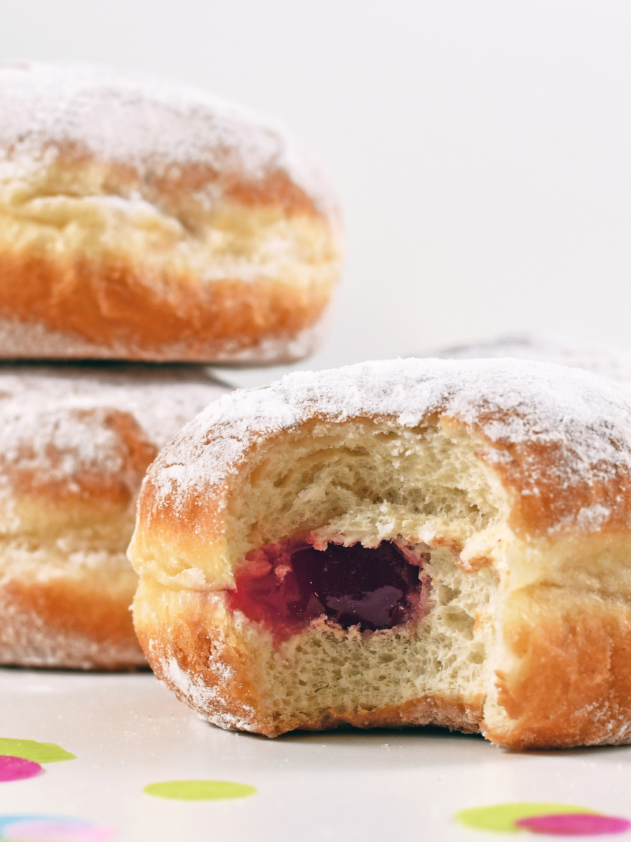 bite out of a jam filled donut