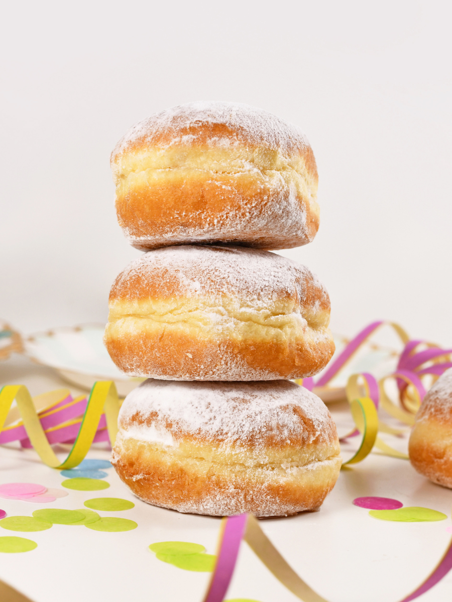 jam filled donuts in a stack