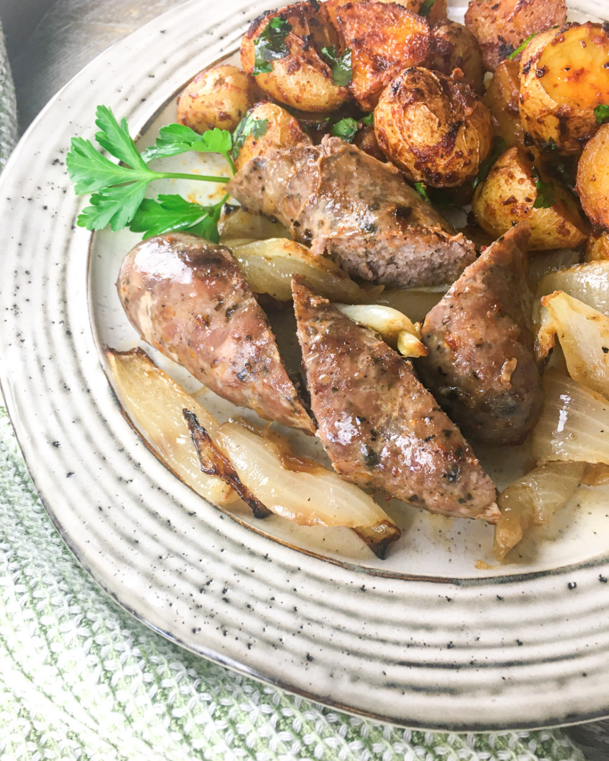 Easy Chorizo and Potatoes Sheet Pan Dinner on a white plate